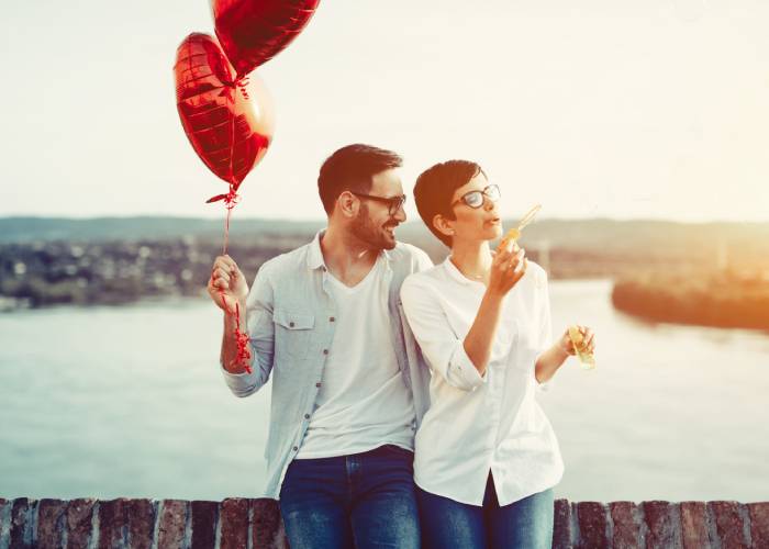 A couple with balloons